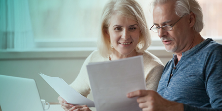 couple with paperwork mobile